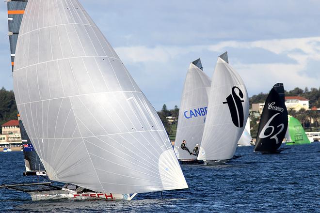 C-tech heads for the finish line as the rest of the fleet follow - JJ Giltinan Championship 2014 © Australian 18 Footers League http://www.18footers.com.au